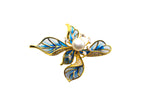 Blue flower-shaped brooch