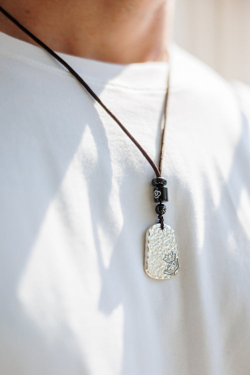 Hammered Silver Pendant With Lotus