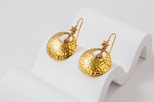 flat lay view of earrings, front