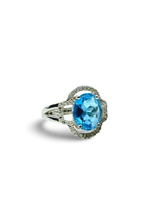 Celestial Blue: Topaz Halo Ring With Adjustable Band