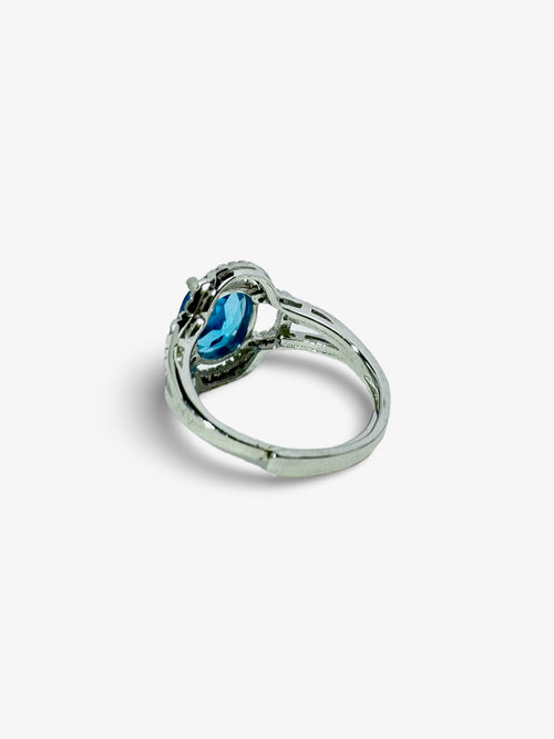 Celestial Blue: Topaz Halo Ring With Adjustable Band