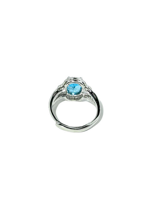 Celestial Blue: Topaz Halo Ring With Adjustable Band